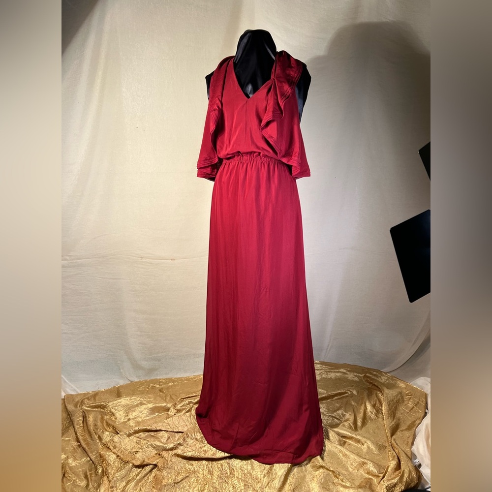 Gucci Fall 2006 Merlot halter top evening gown.
Size 8, 100% silk.